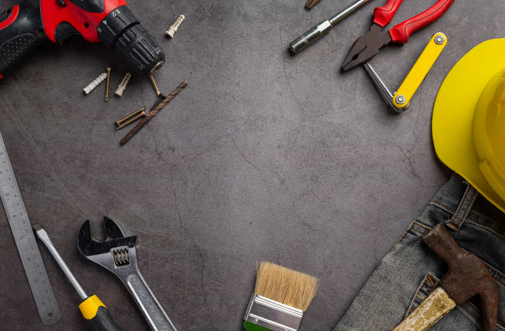 variety of tools on grey background