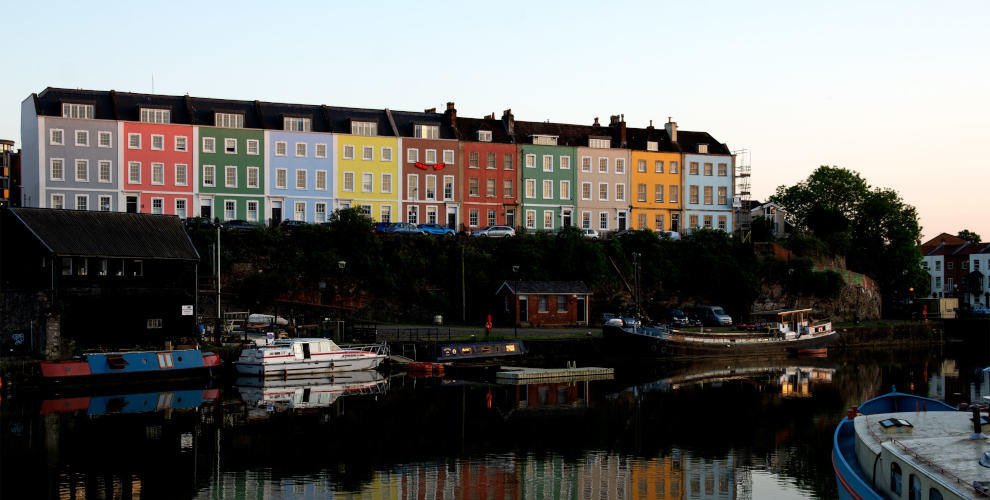 row of colourful houses above harbour in Bristol, UK